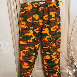 Fashion Nova Neon Orange and Green Camo Pants in Boys